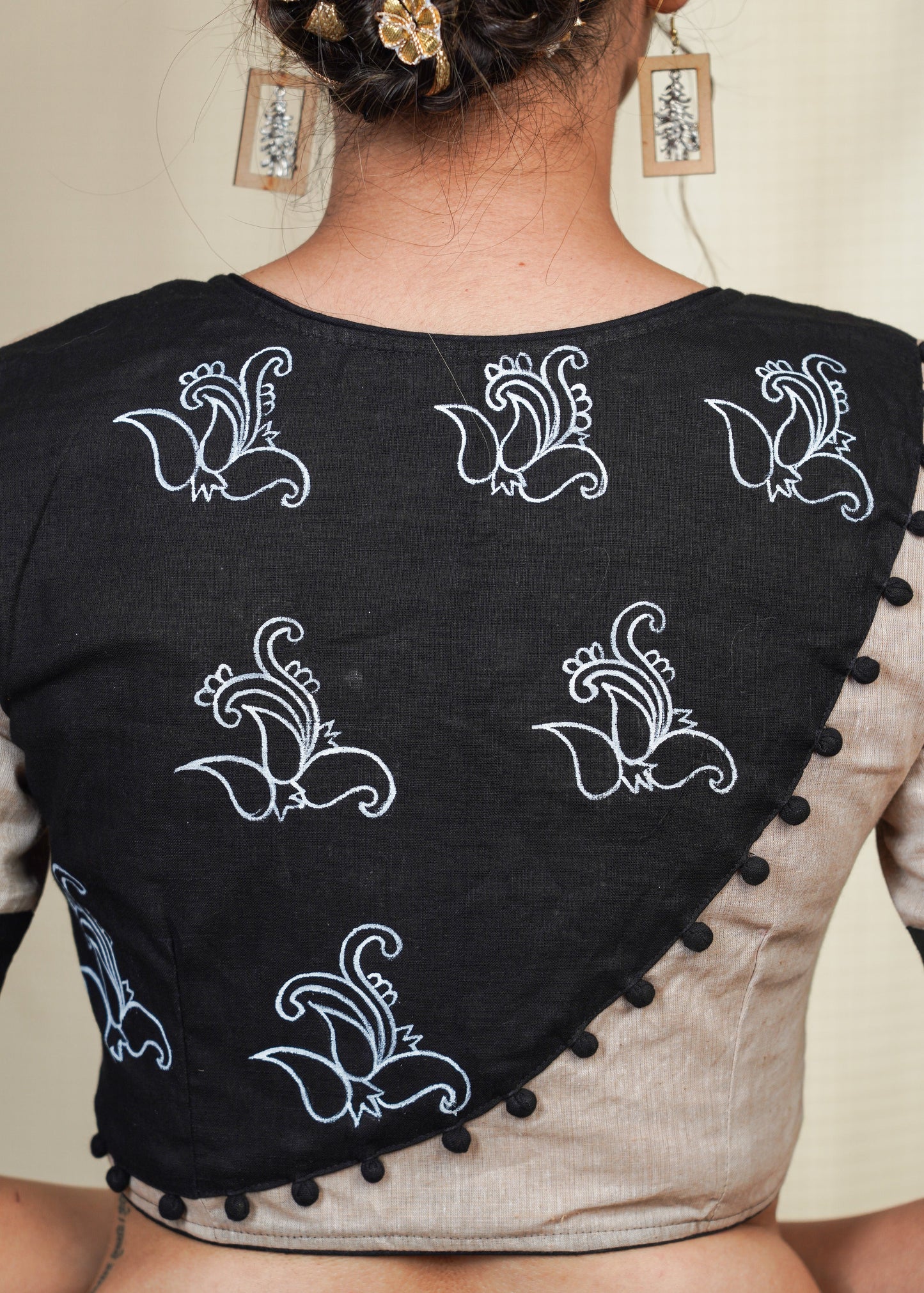 Beige Handloom Cotton Blouse With Hand Painted Motifs at the Back and sleeves and potli work