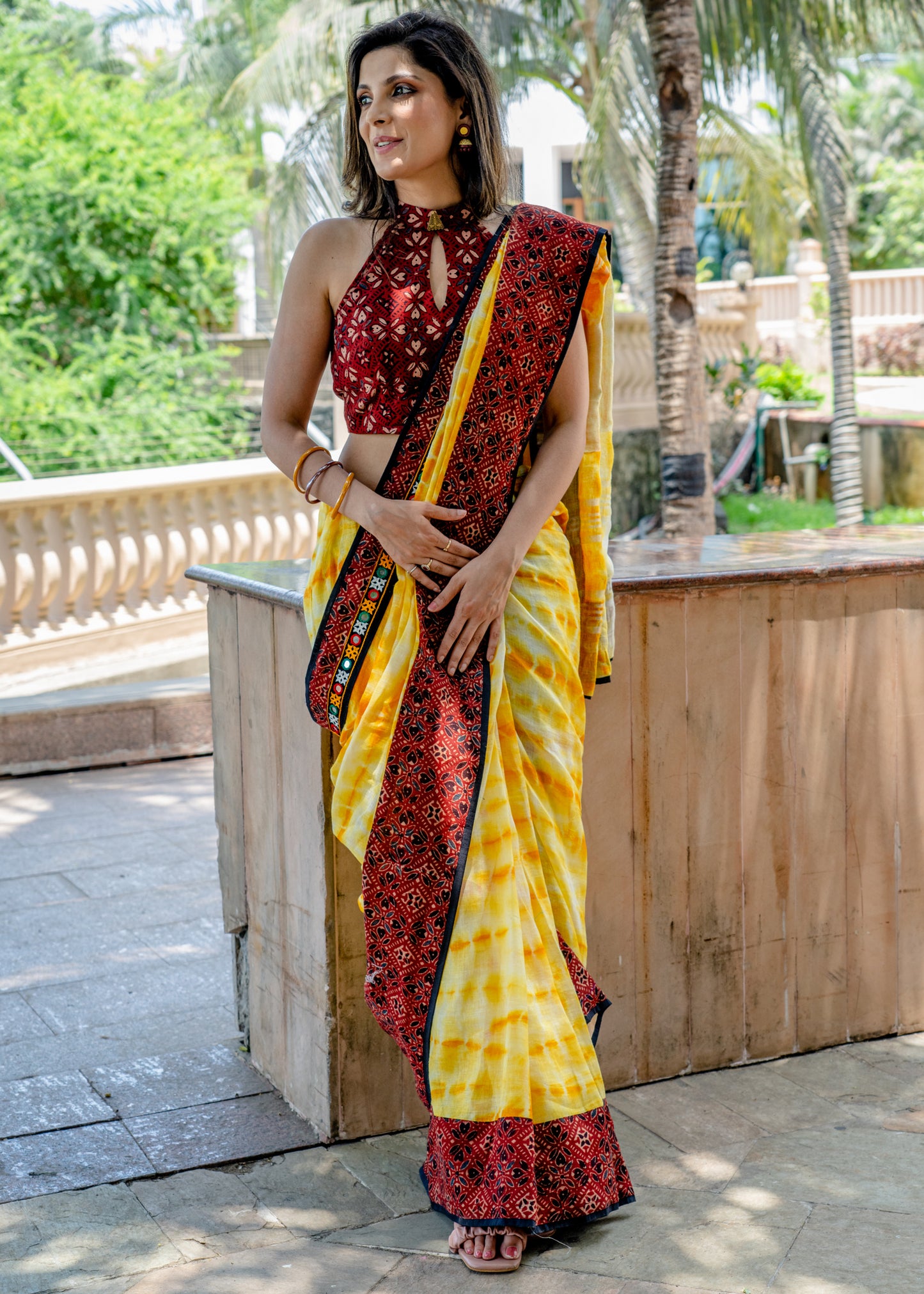 Exclusive Linen shibori saree with Ajrakh & Kutchi Mirror work border