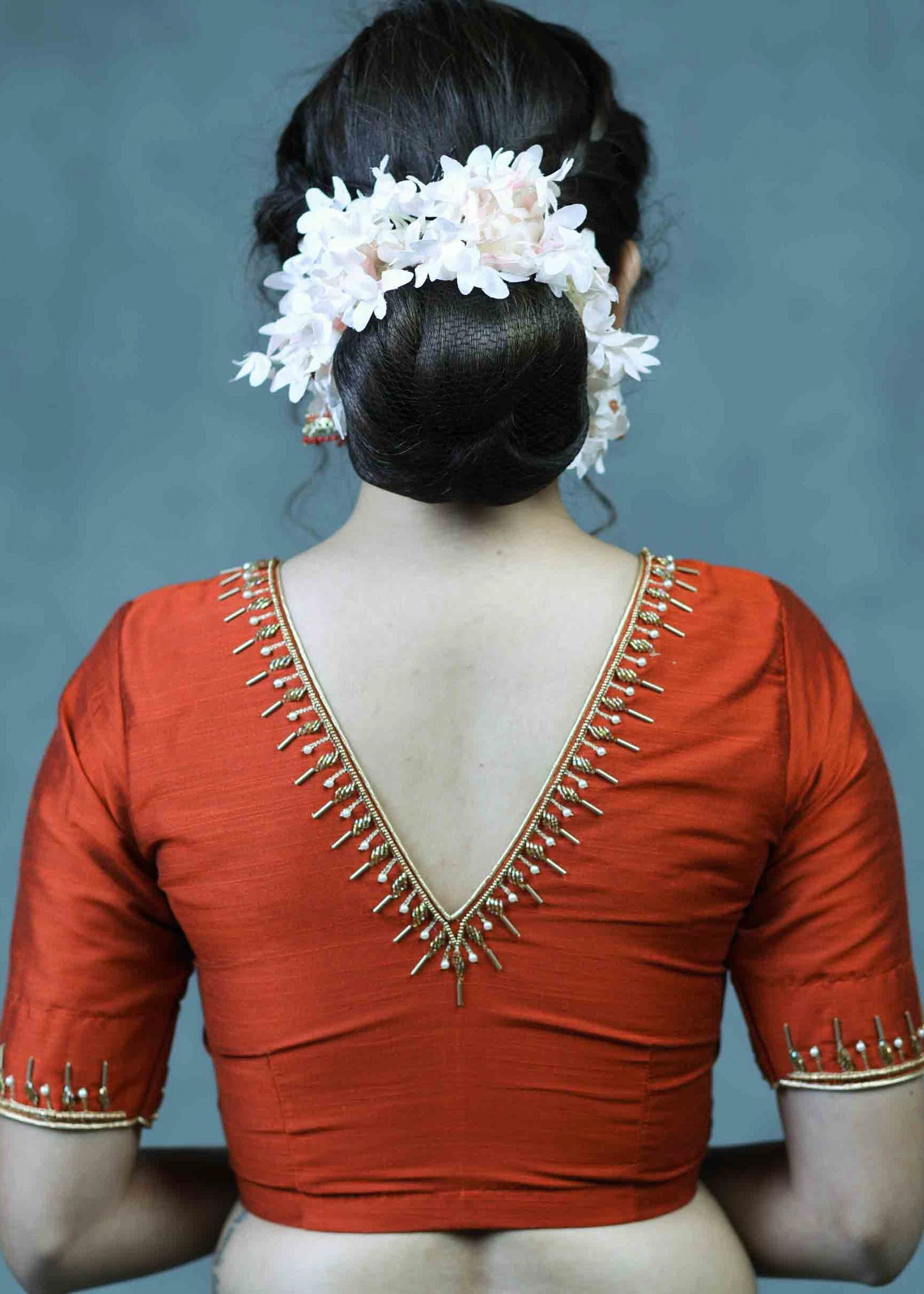 Exclusive Rust Cotton Silk Blouse with Beautiful Hand Embroidery on Neck and Sleeves