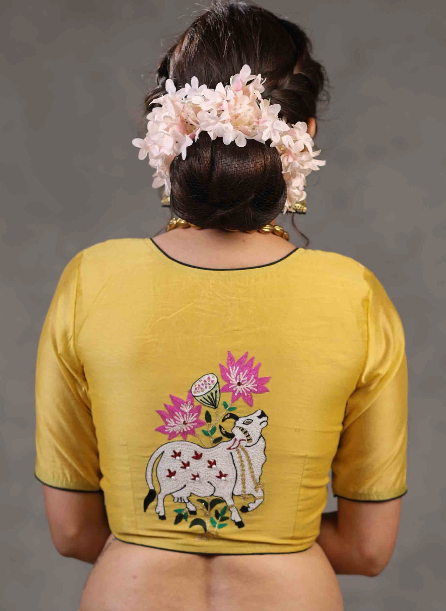 Classy Yellow Chanderi Blouse with Beautiful Cow Embroidered Motif on The Back