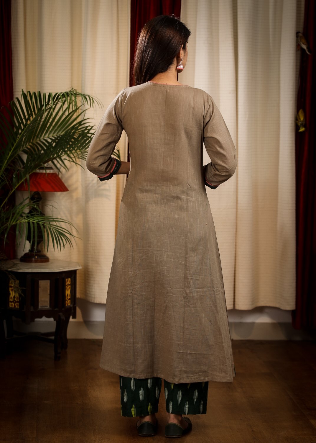 A - line Cement Color Handloom Cotton Kurta With Beautiful Peach Embroidery and Ikat Cuffs n Pockets