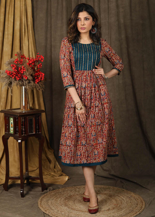 Elegant kalamkari dress with beautiful teal embroidered yoke