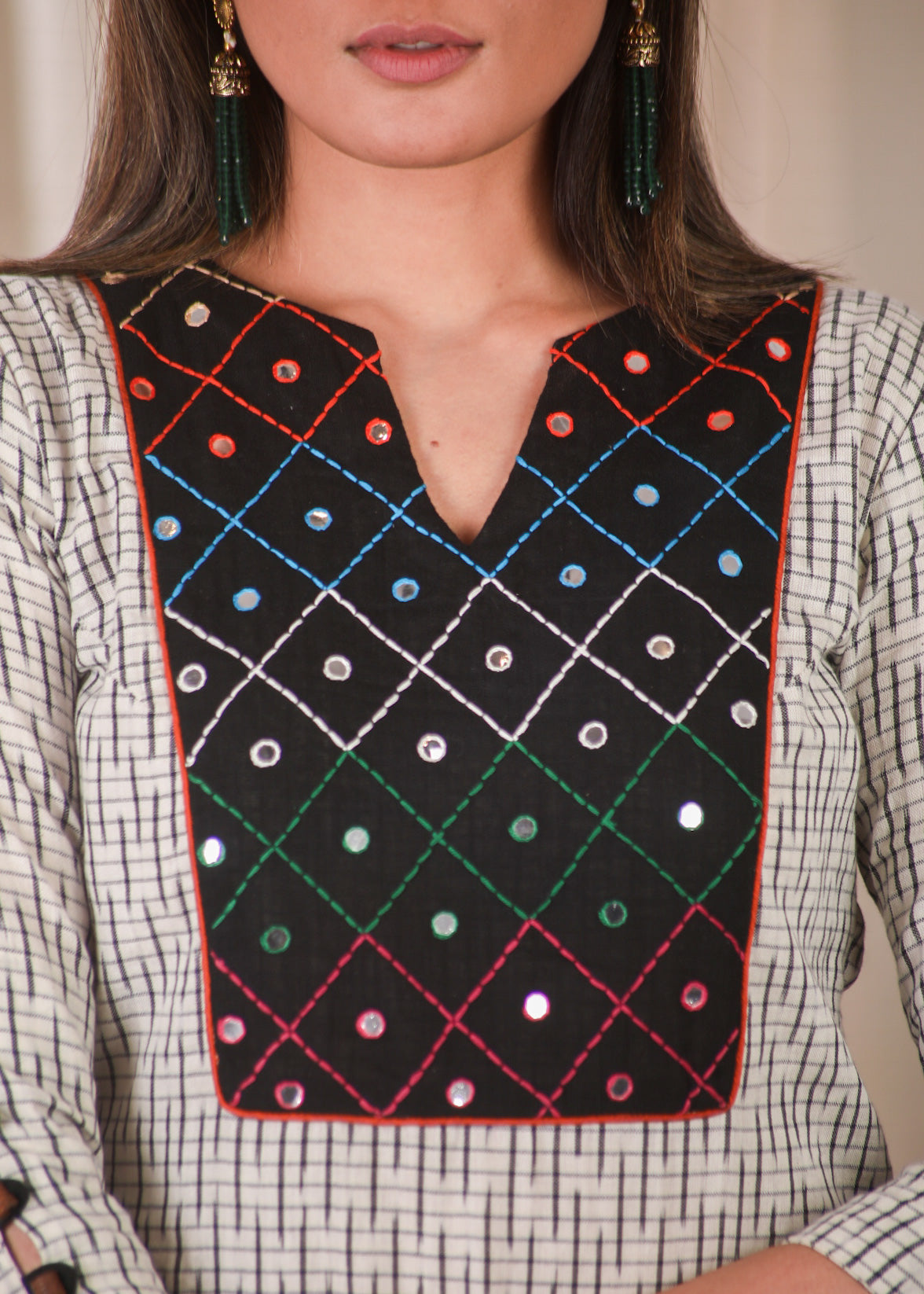 Graceful Straight Cut Ikat Kurta with Hand Embroidered Mirror Work On the Yoke and Beaded Sleeves