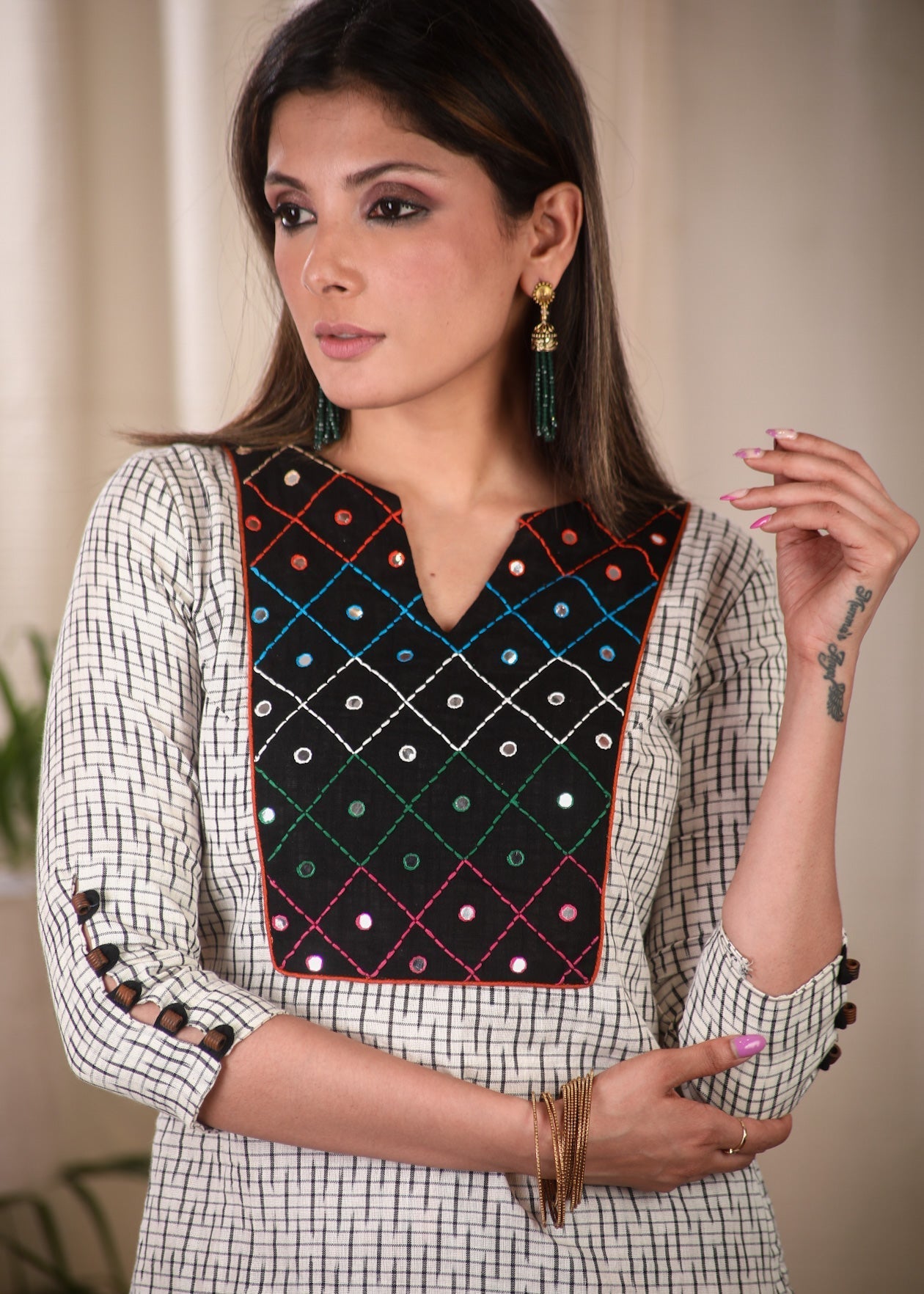 Graceful Straight Cut Ikat Kurta with Hand Embroidered Mirror Work On the Yoke and Beaded Sleeves