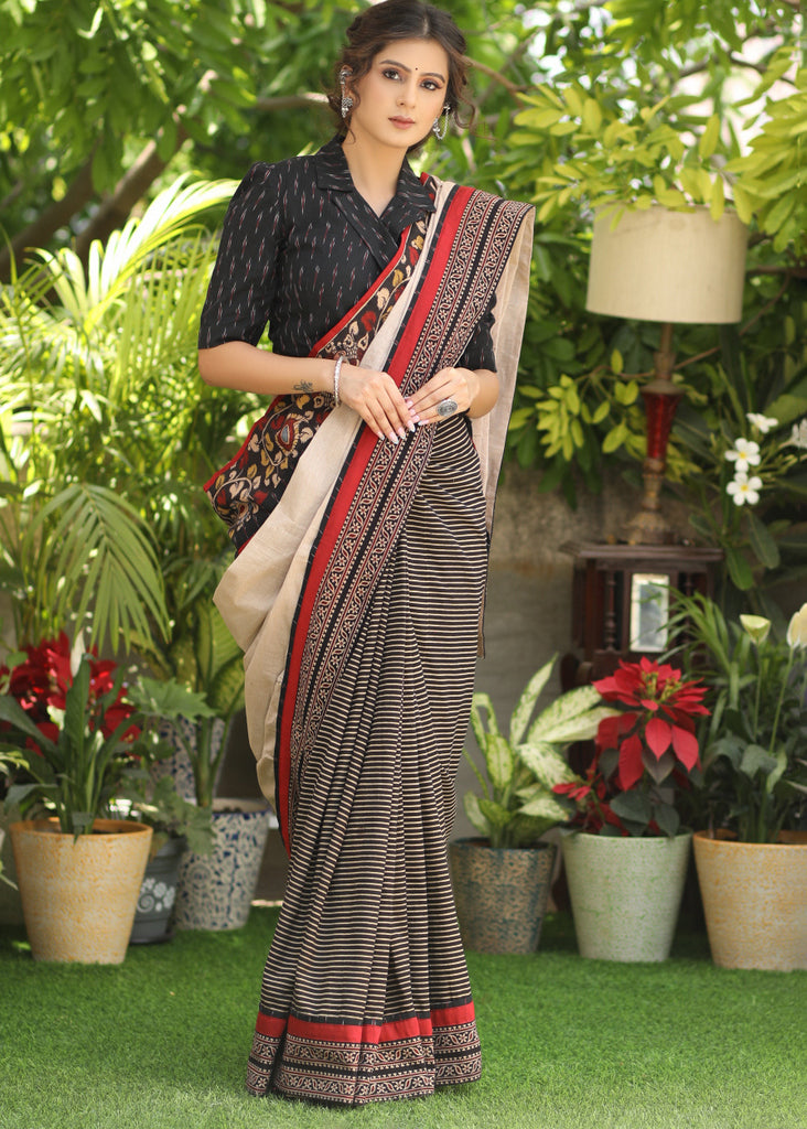 Regal cotton line Ajrakh saree with cream Pallu and Kalamkari border