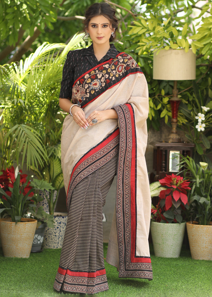 Regal cotton line Ajrakh saree with cream Pallu and Kalamkari border