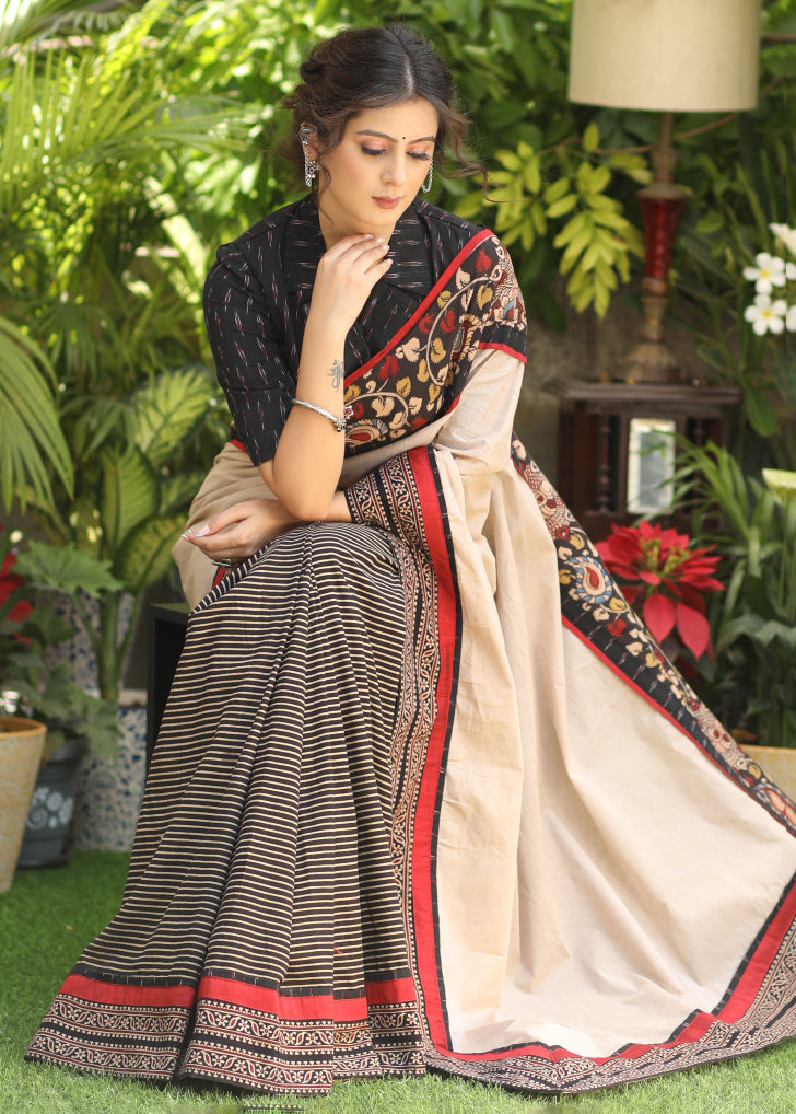 Regal cotton line Ajrakh saree with cream Pallu and Kalamkari border