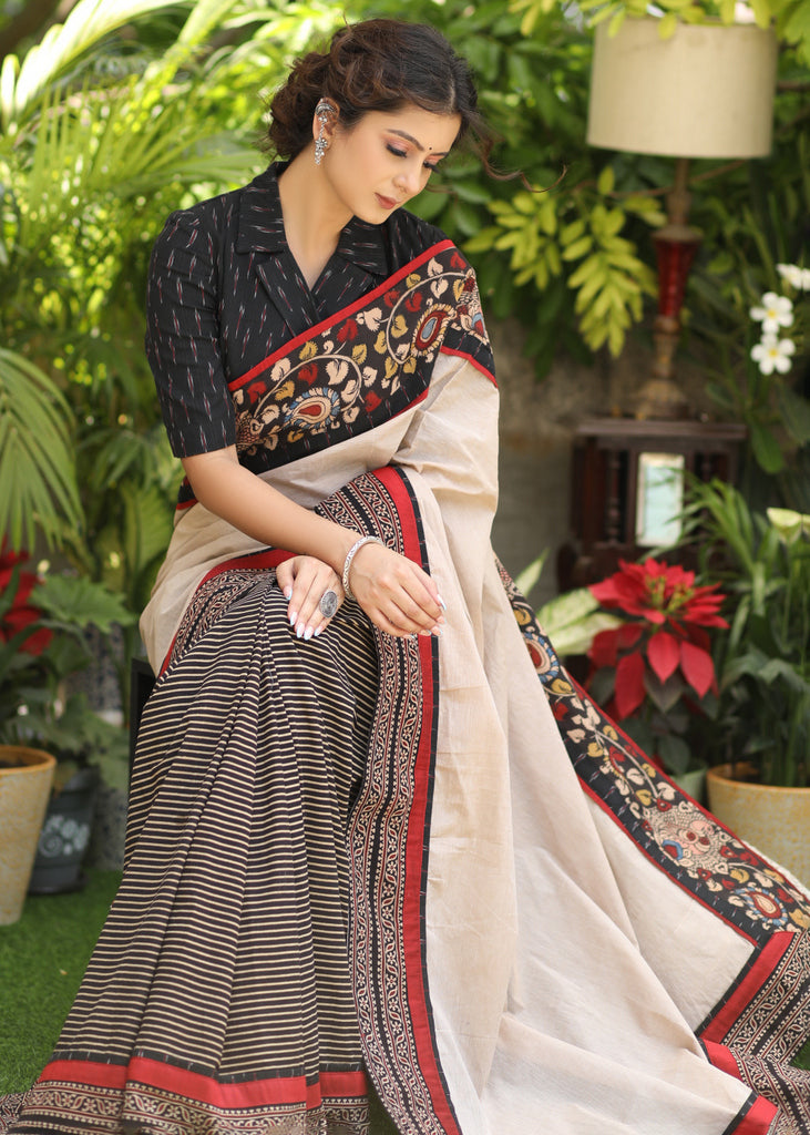 Regal cotton line Ajrakh saree with cream Pallu and Kalamkari border