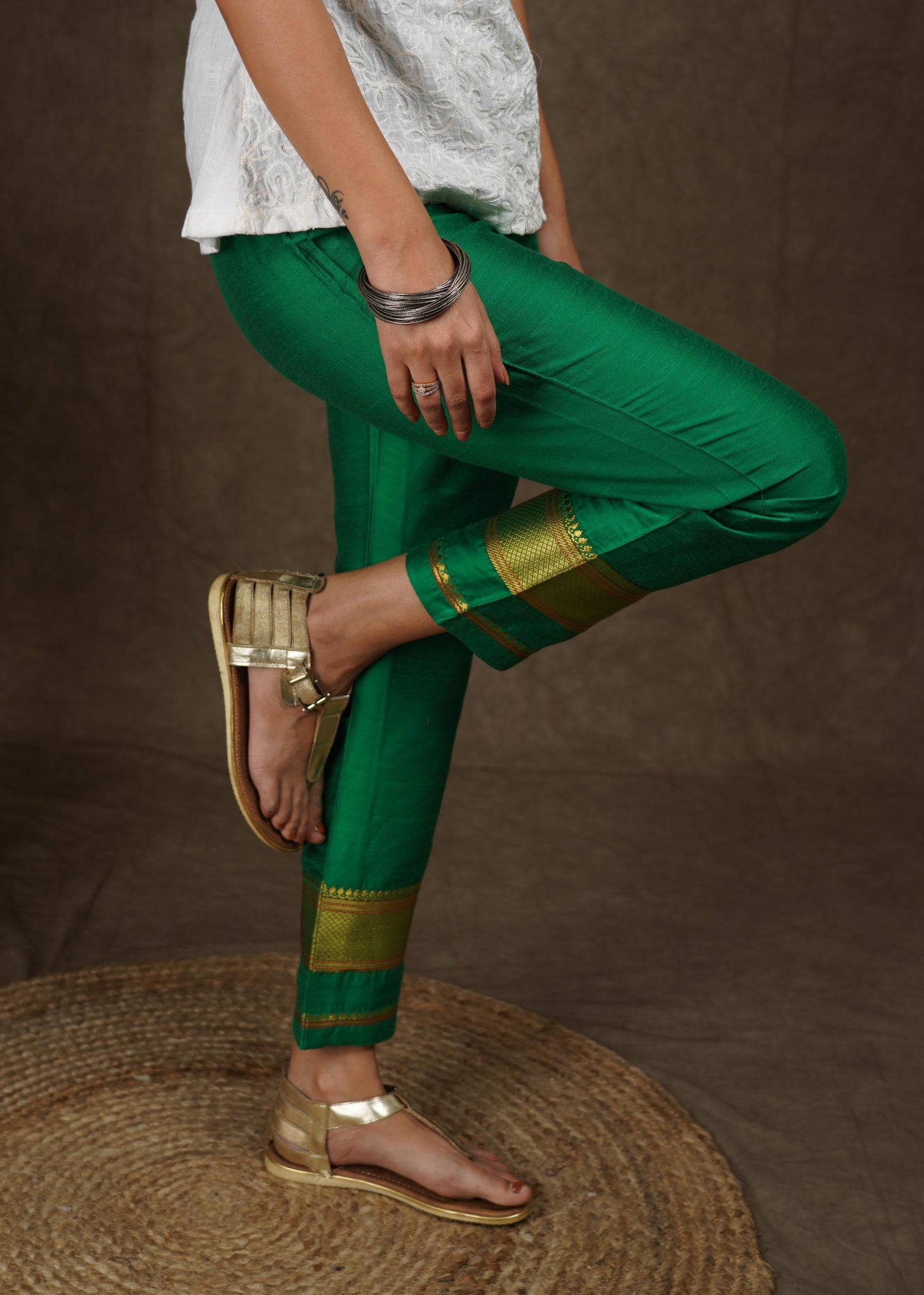 Green cotton silk narrow pant with banarasi border