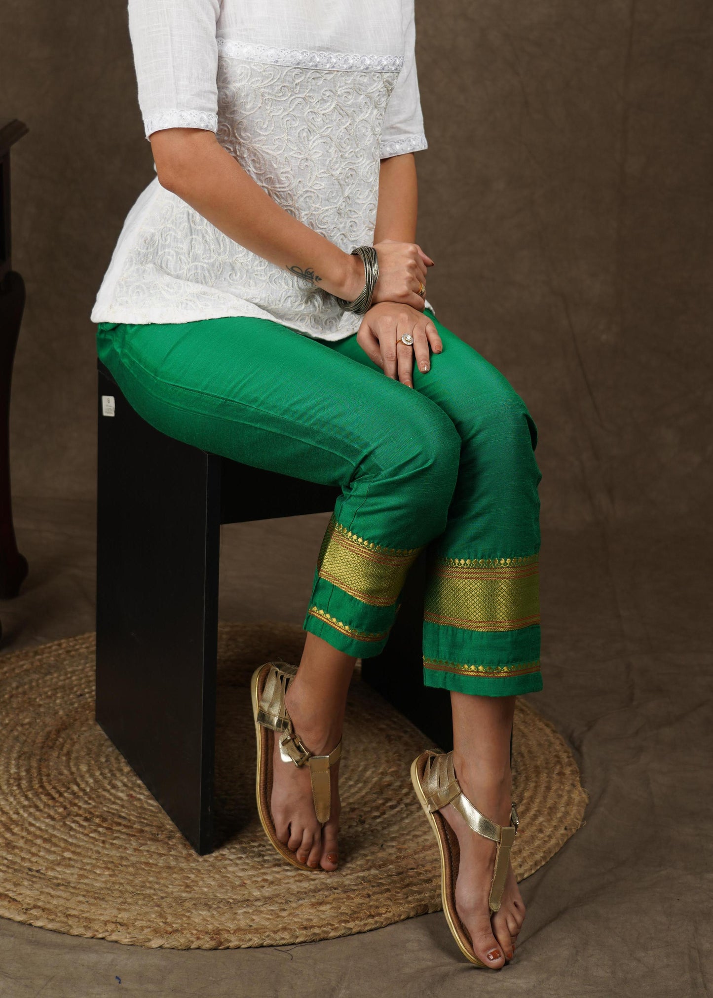 Green cotton silk narrow pant with banarasi border