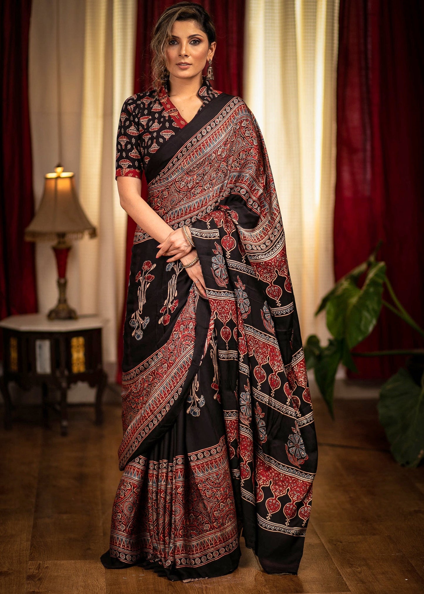 Exclusive modal silk hand block printed black Ajrakh saree