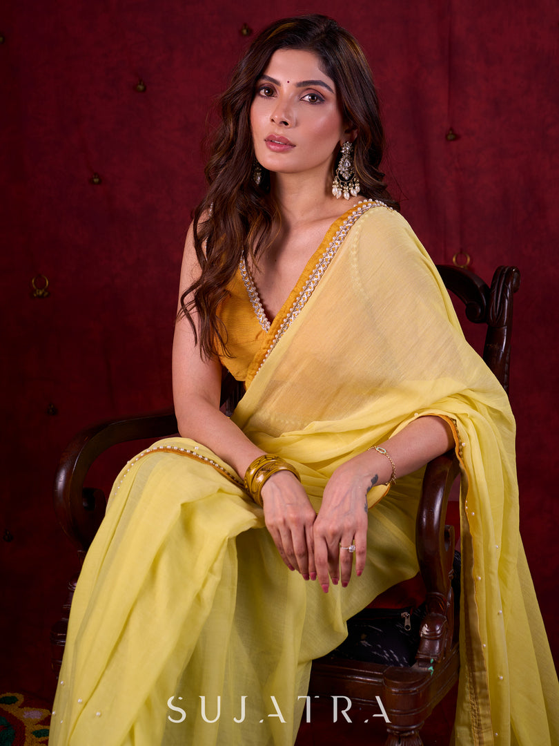 Light Yellow Mul Cotton Saree with Contrasting Mustard Border & Pearl Embroidered Pallu