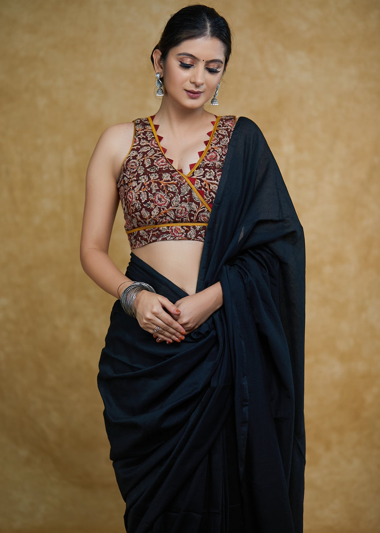 Exclusive Kalamkari Print Sleeveless Blouse with Mustard & Maroon Detailing