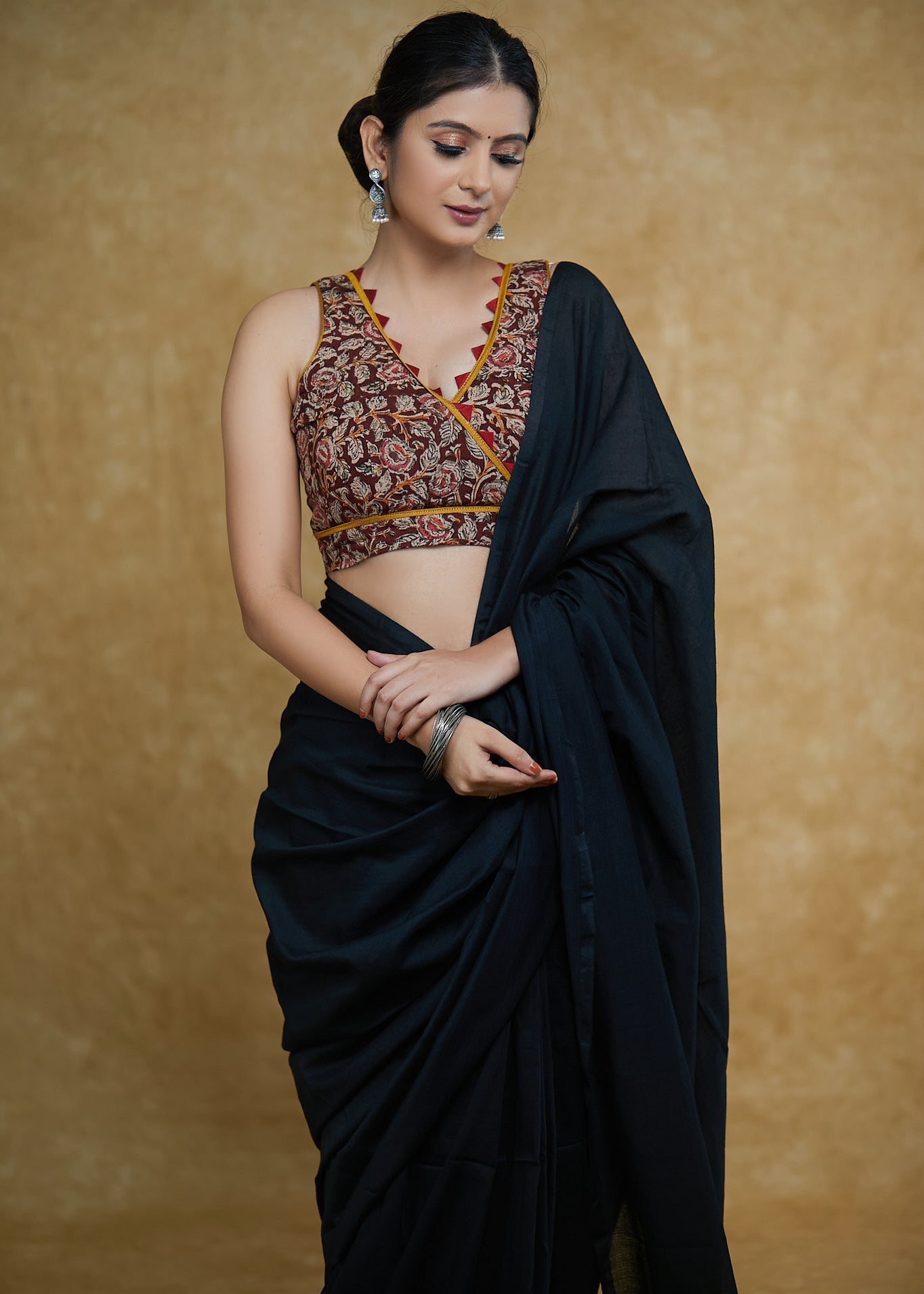 Exclusive Kalamkari Print Sleeveless Blouse with Mustard & Maroon Detailing