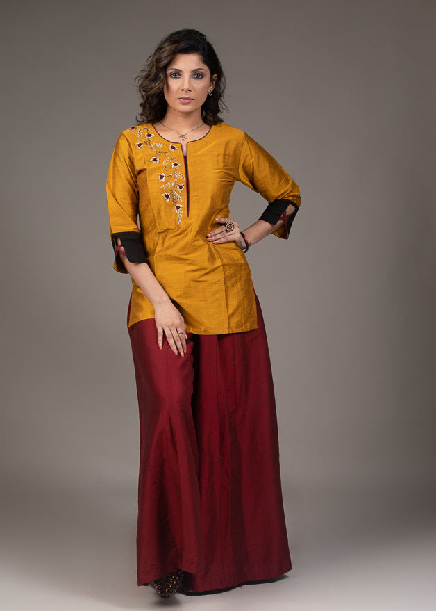 Exclusive mustard cotton top with hand embroidered zardosi embroidery