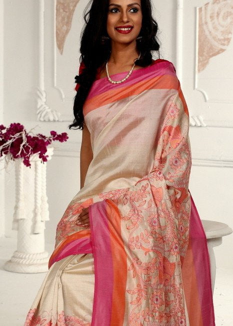 Intricate embroidery all over on beige semi silk saree