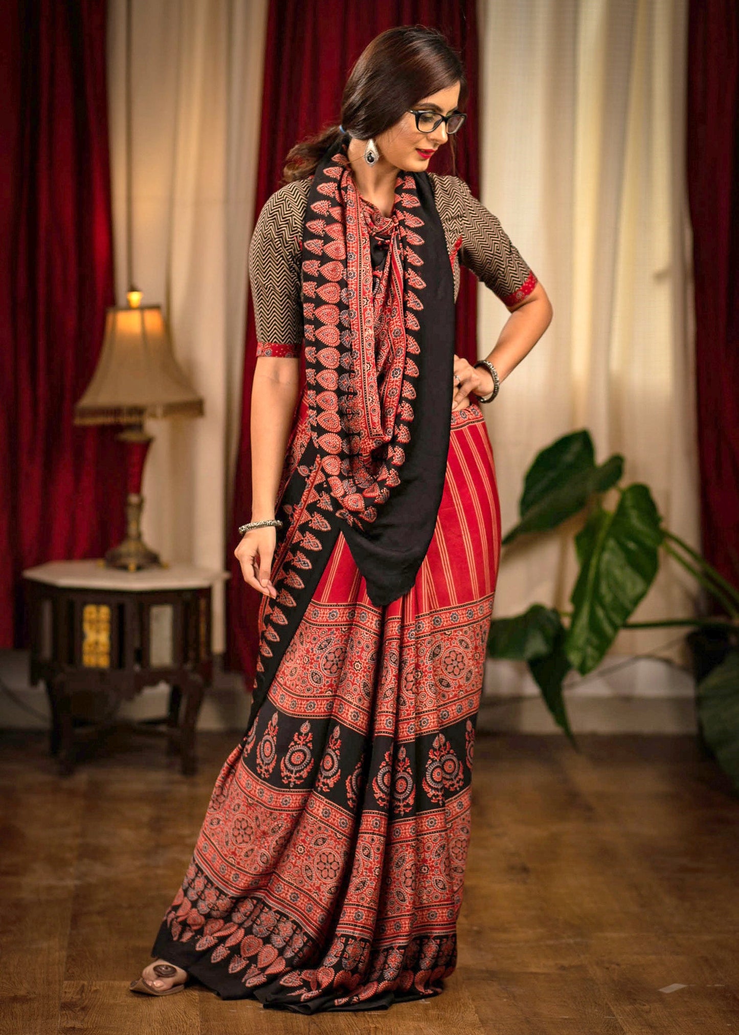 Exclusive block printed maroon modal silk Ajrakh saree