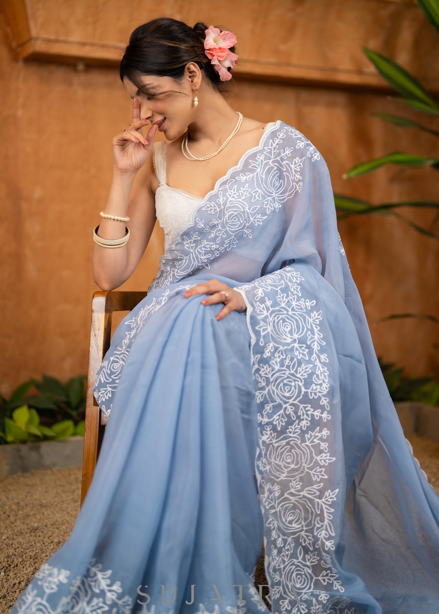 Elegant Powder Blue Organza Saree Highlighted With Overall Intricate Floral Embroidery