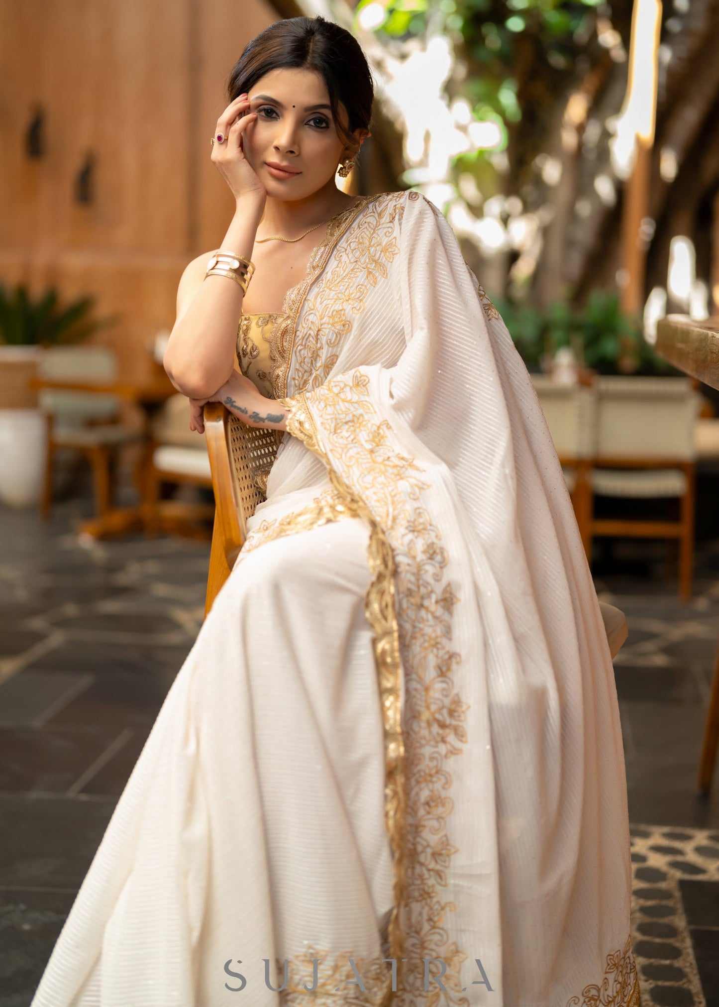 Subtle White Georgette Saree With Beautiful Sequenced Crochet Highlighted With Intricate Floral Embroidery And Scalloped Lace