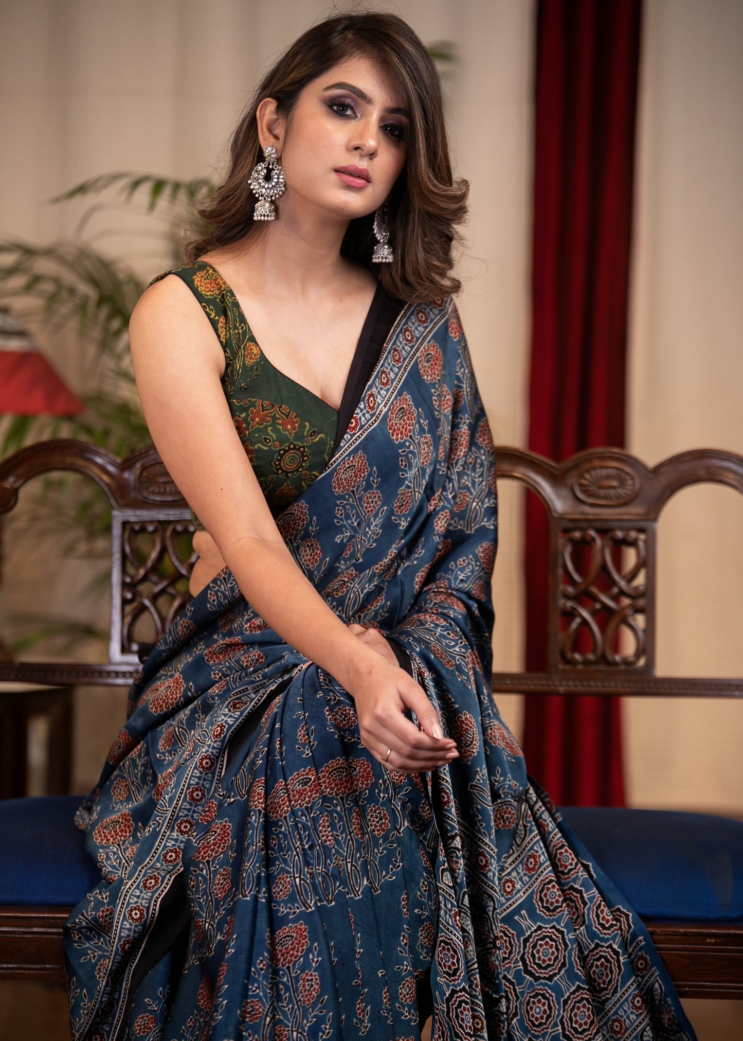 Pure modal silk block printed blue Ajrakh saree with floral motifs