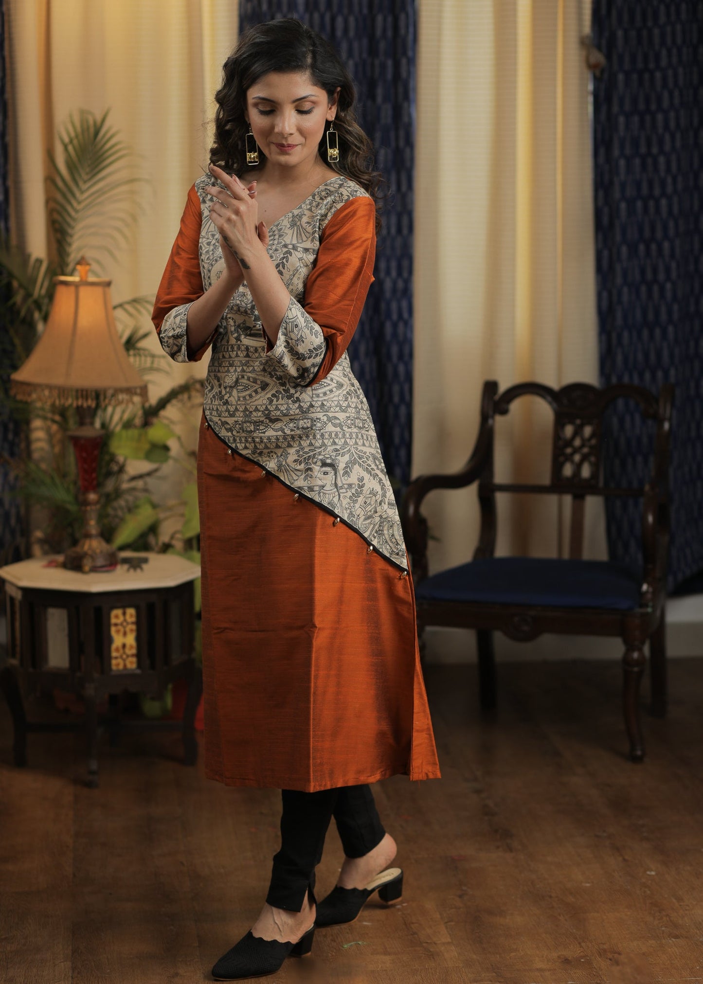 A- line Rust Cotton silk kurta with Exclusive Madhubani details