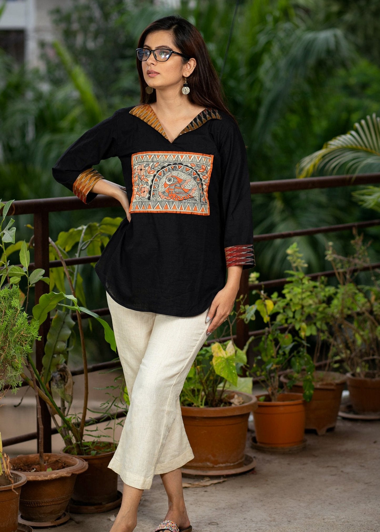 Black cotton top with hand painted Madhubani work