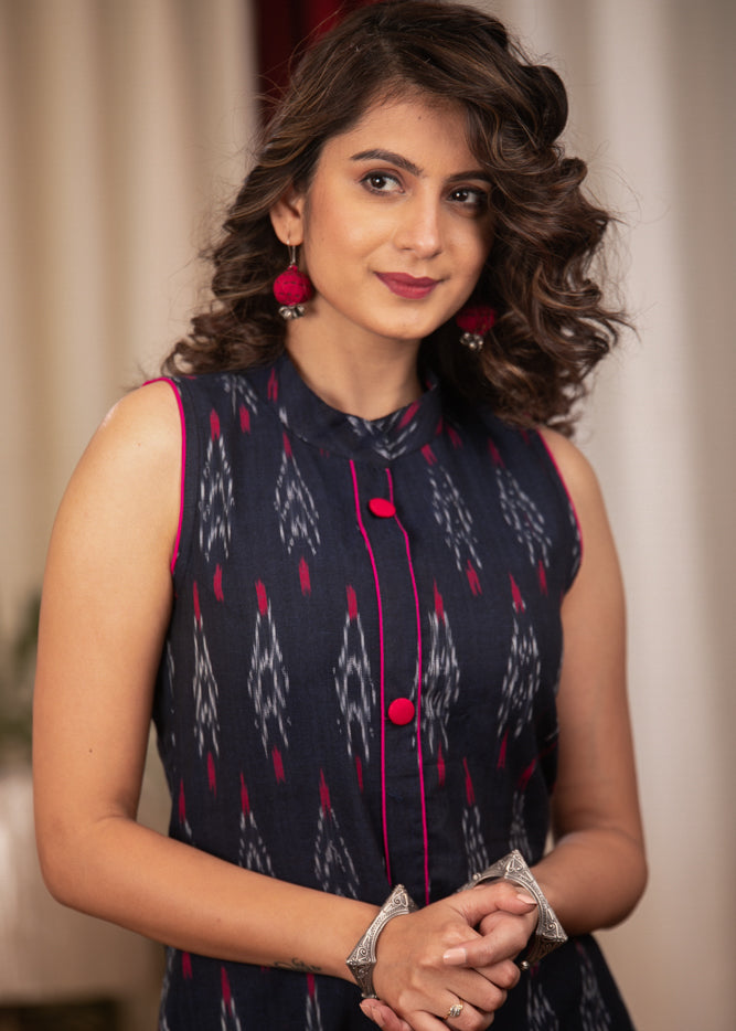 Straight Cut Smart Ikat sleeveless Cotton Kurta .