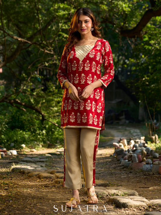 Vibrant red viscose short kurta showcasing a charming floral print, refined pintuck neck panel
