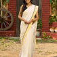Exclusive off white mul saree with yellow hakoba border paired with Kutch mirror work border