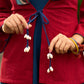 Festive Red Kalamkari Jacket with Shell Tassels – Styled with Rayon Dress