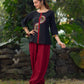 Classic Black Cotton Silk Top Featuring Delicate Mirror Work Accents And A Bold Maroon Placket