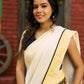 Exclusive off white mul saree with yellow hakoba border paired with Kutch mirror work border