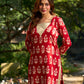 Vibrant red viscose short kurta showcasing a charming floral print, refined pintuck neck panel