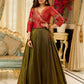 Luminous Green tissue lehenga with a classic Red Angrakha choli featuring intricate hand embroidery.