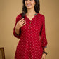 Red rayon bandhani top beautifully combined with classic ikat collar.