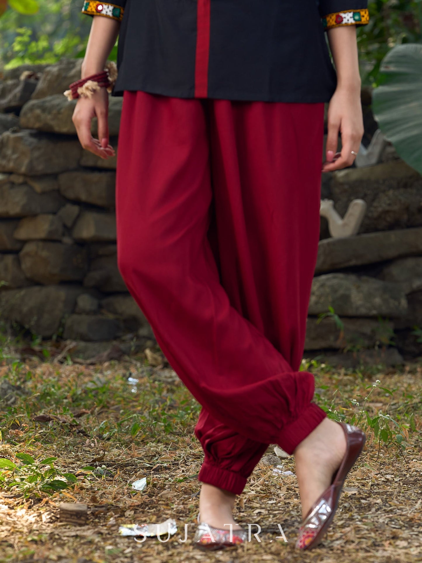 Classic Black Cotton Silk Top Featuring Delicate Mirror Work Accents And A Bold Maroon Placket