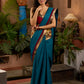 Teal cotton saree with Kalamkari border and rich khun border detailing