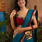 Teal cotton saree with Kalamkari border and rich khun border detailing