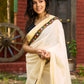 Exclusive off white mul saree with yellow hakoba border paired with Kutch mirror work border