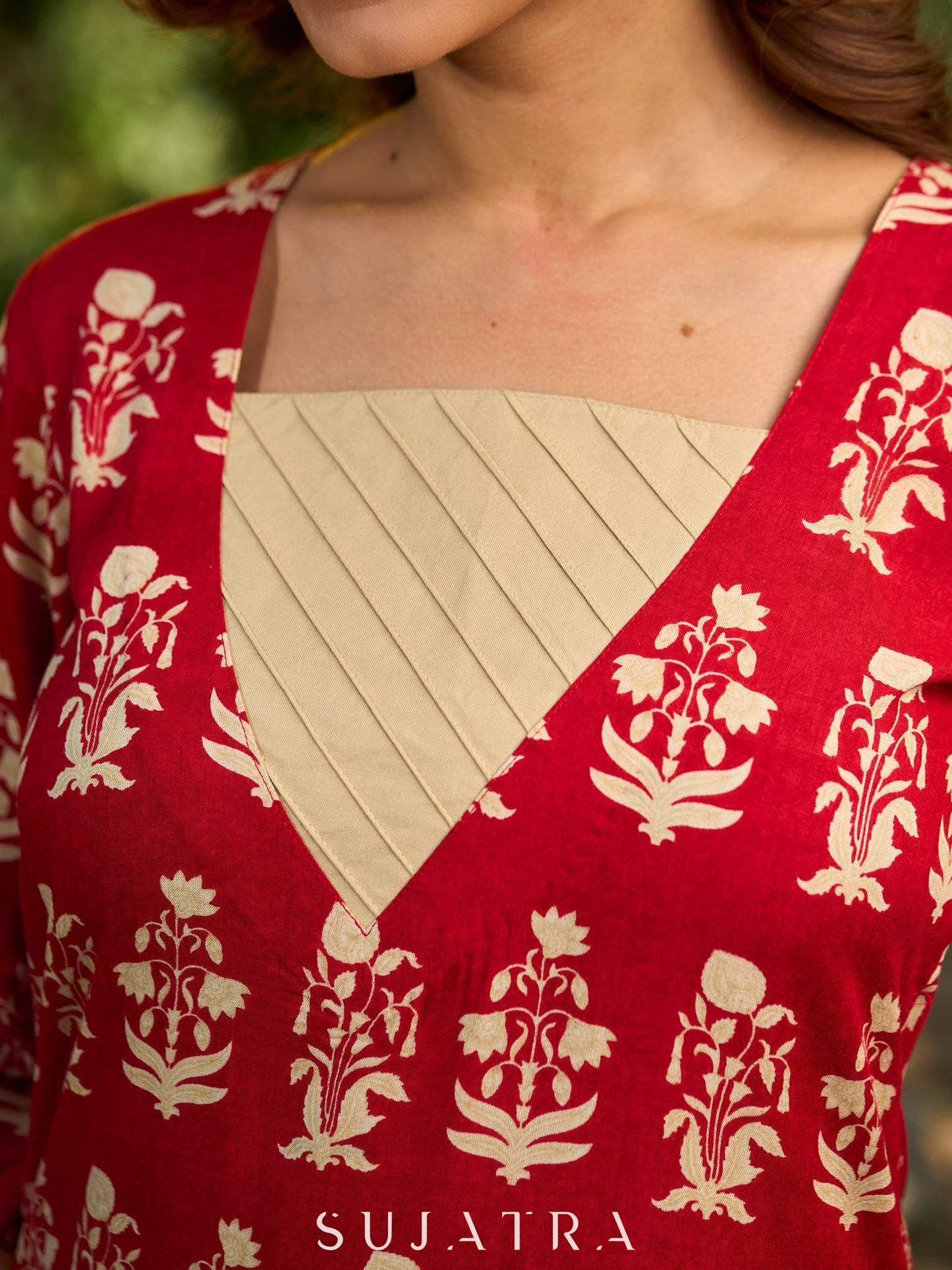 Vibrant red viscose short kurta showcasing a charming floral print, refined pintuck neck panel