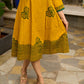 Contemporary Mustard Floral Hand Block Print Dress featuring Front & Back Box Pleat with Geometric Border on Hem & Sleeves
