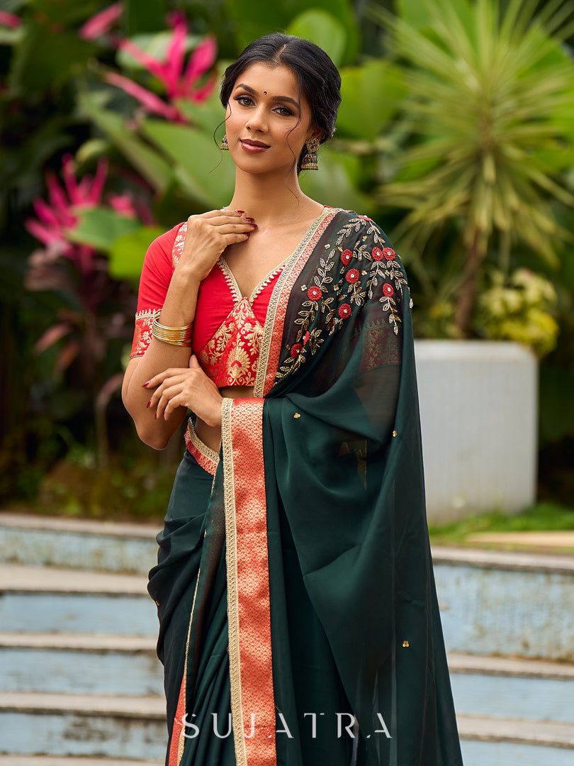 Timeless Bottle Green Georgette Saree with Contrast Red Benarasi Border & Hand Embroidered Pallu