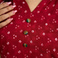 Red rayon bandhani top beautifully combined with classic ikat collar.
