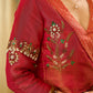 Luminous Green tissue lehenga with a classic Red Angrakha choli featuring intricate hand embroidery.