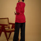 Red rayon bandhani top beautifully combined with classic ikat collar.