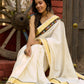 Exclusive off white mul saree with yellow hakoba border paired with Kutch mirror work border
