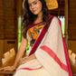 Striking white cotton saree with bold red-black borders, featuring a hand-painted Durga motif