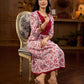 Elegant white floral Jaipuri printed dress with a delicately pintucked red panel, gathered sleeves, and rich red accents.