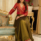 Luminous Green tissue lehenga with a classic Red Angrakha choli featuring intricate hand embroidery.