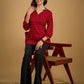 Red rayon bandhani top beautifully combined with classic ikat collar.